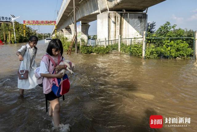 洪水围城｜新一轮降雨将至，河南卫辉城区8.6万人紧急转移