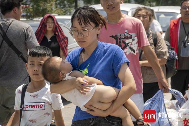 洪水围城｜新一轮降雨将至，河南卫辉城区8.6万人紧急转移