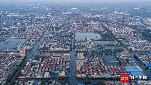 洪水围城｜新一轮降雨将至，河南卫辉城区8.6万人紧急转移