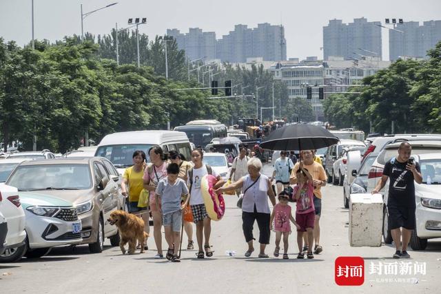 洪水围城｜新一轮降雨将至，河南卫辉城区8.6万人紧急转移