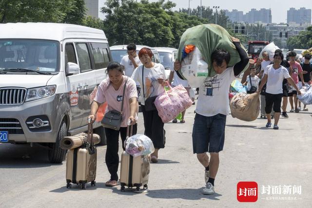 洪水围城｜新一轮降雨将至，河南卫辉城区8.6万人紧急转移