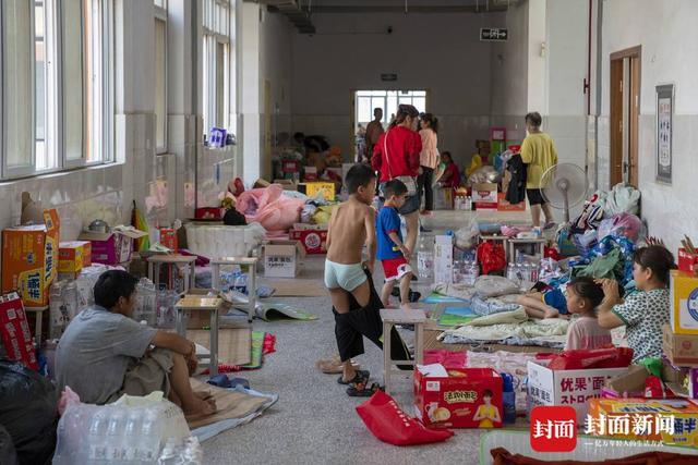 洪水围城｜新一轮降雨将至，河南卫辉城区8.6万人紧急转移